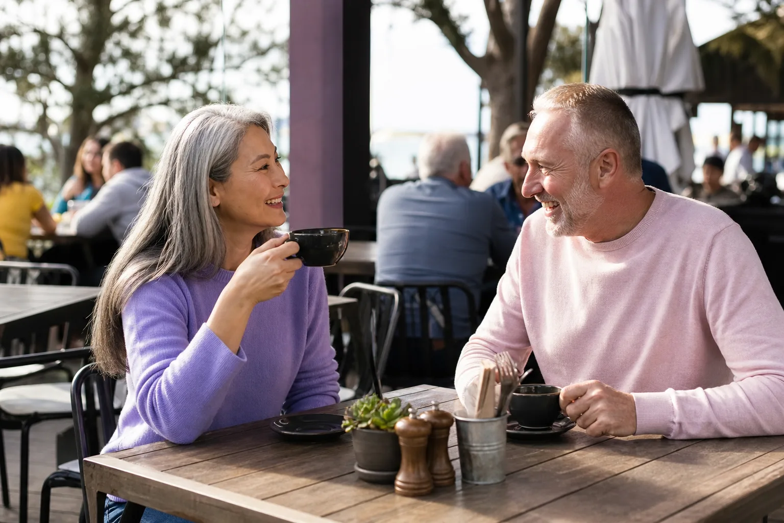Mature couple talking beside the Newcastle and Gateshead Quayside